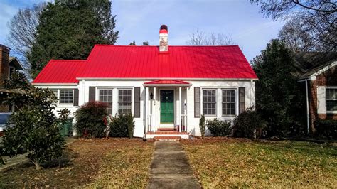 white brick house with red metal roof|metal roofs on brick houses.